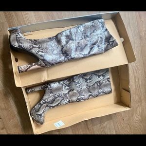 Snake skin platform knee high boots